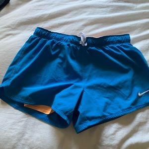 Nike Dri fit short size small blue with orange